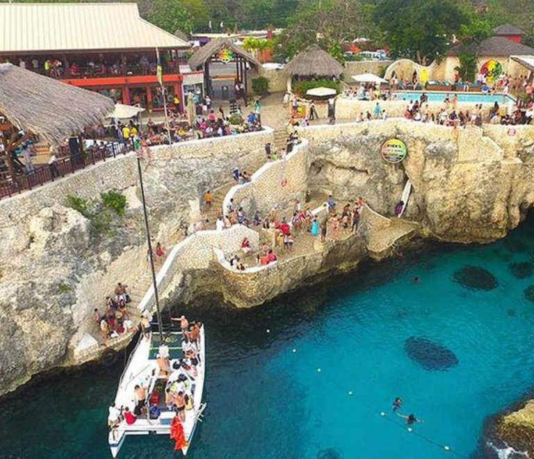 Jamaica in a Day: Catamaran Cruise, Negril Beach, and Rick’s Cafe